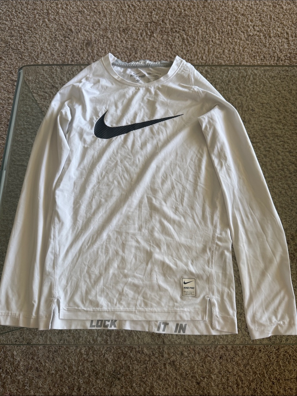 Nike White Long Sleeve Dri-FIT Top with Black Swoosh